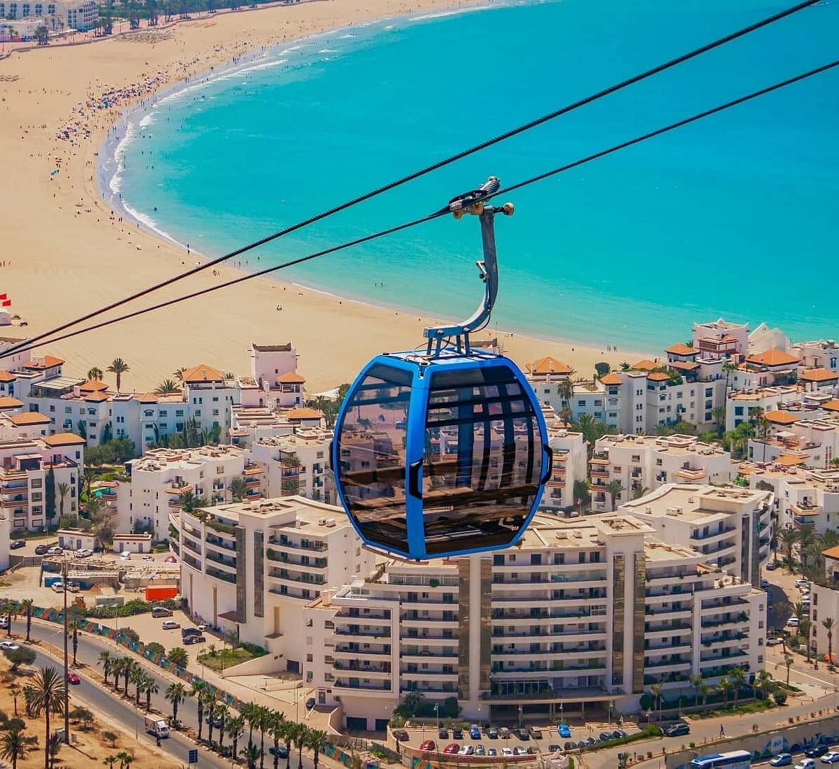Cable car gondola above the beach and bay of Agadir