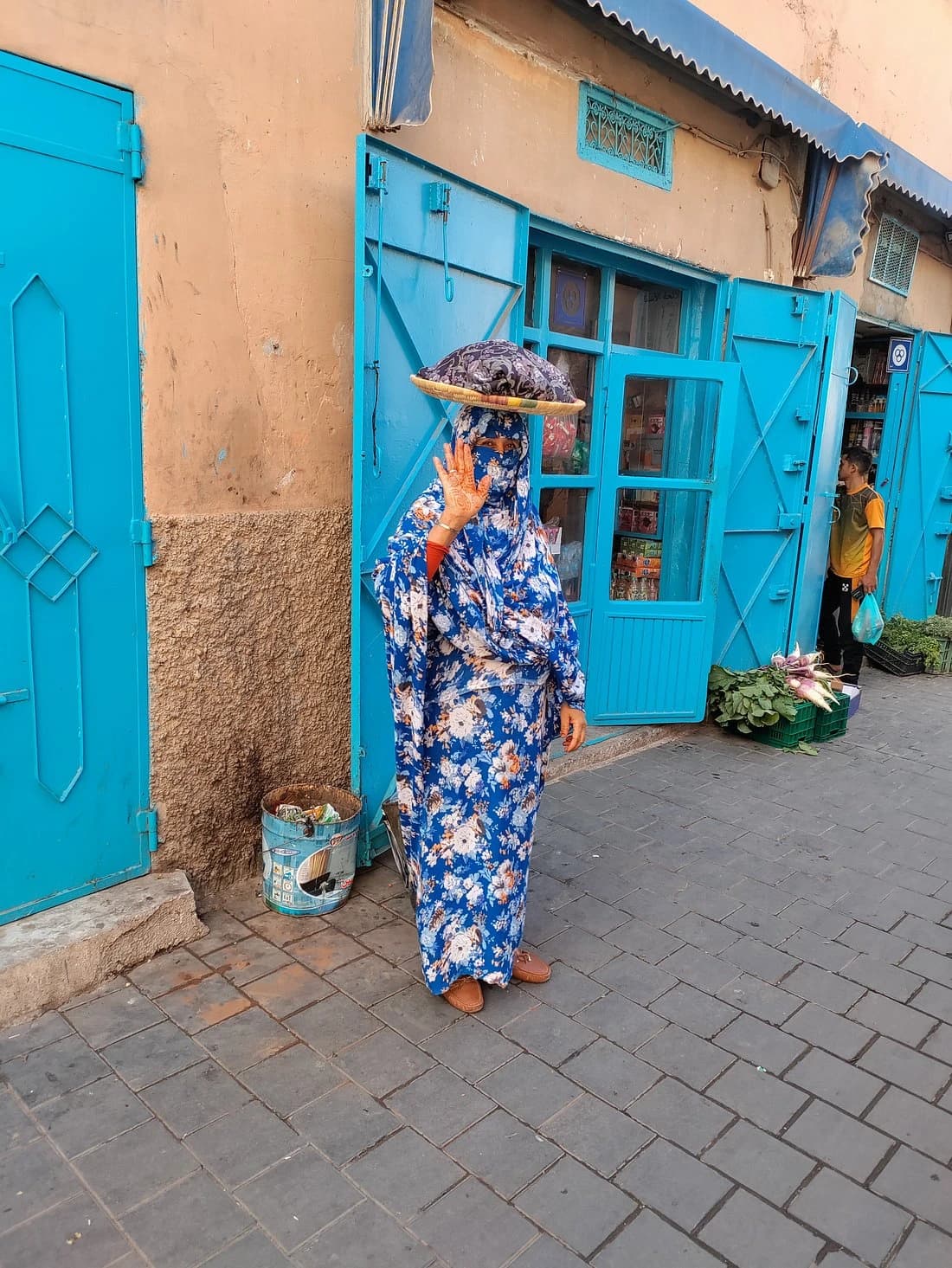 Stalls and shoppers in a traditional Moroccan souk