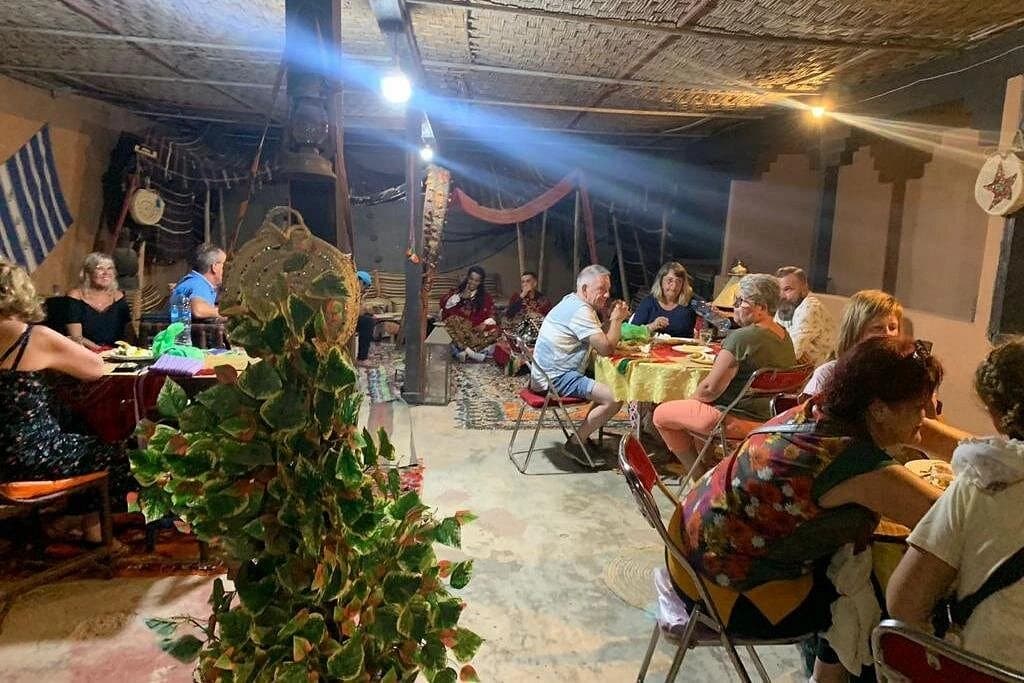 Guests seated at tables in the barbecue dining room