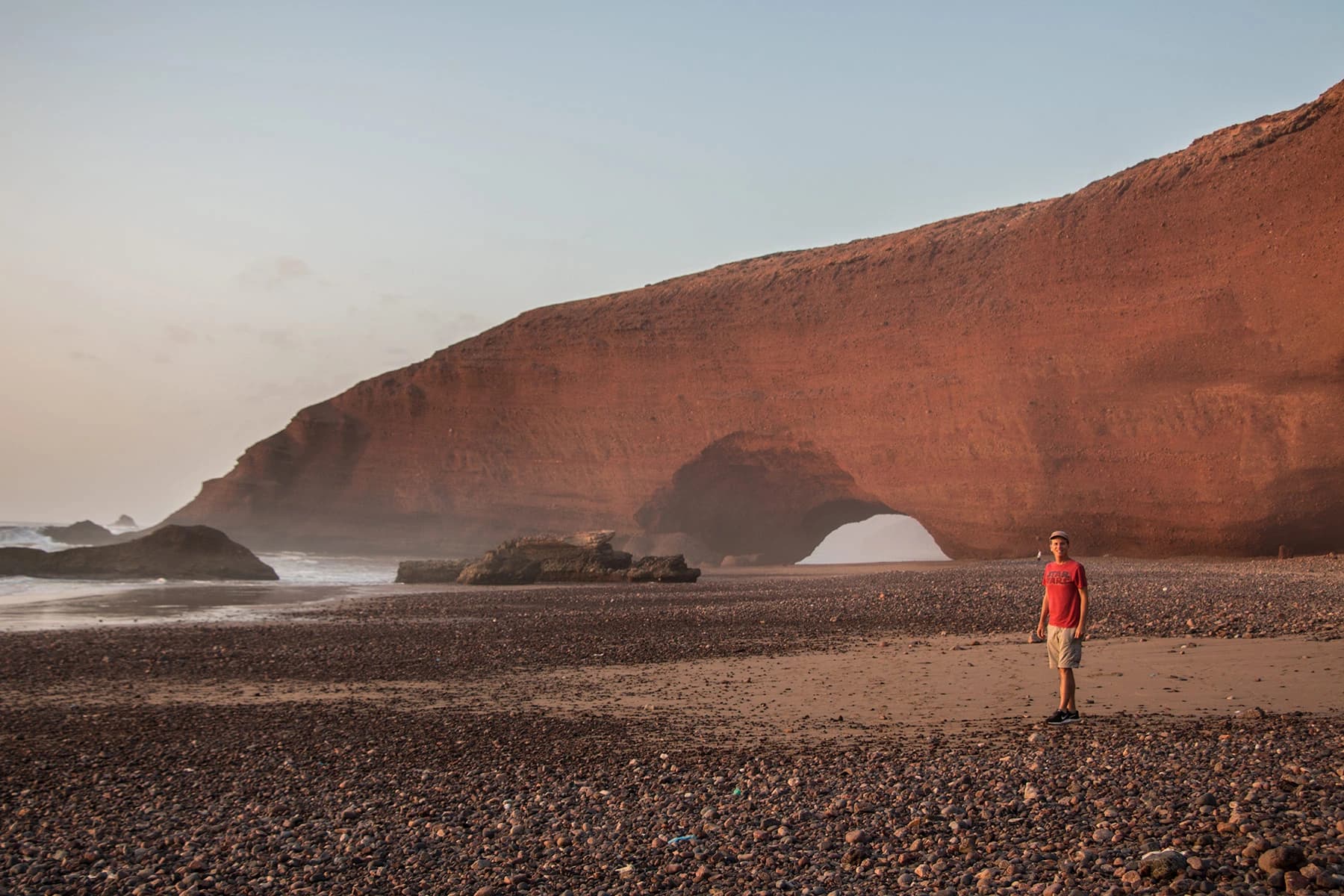 The iconic red sandstone arch at Legzira Beach on the Atlantic coast