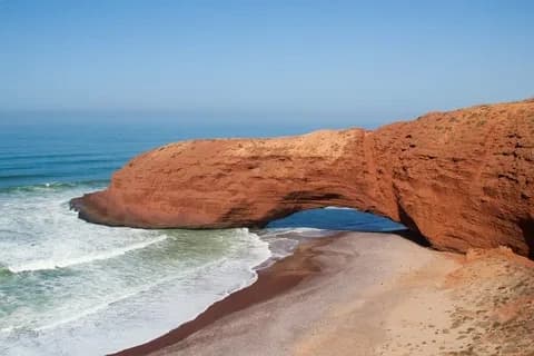 Red sandstone cliffs and the Atlantic coast at Legzira Beach