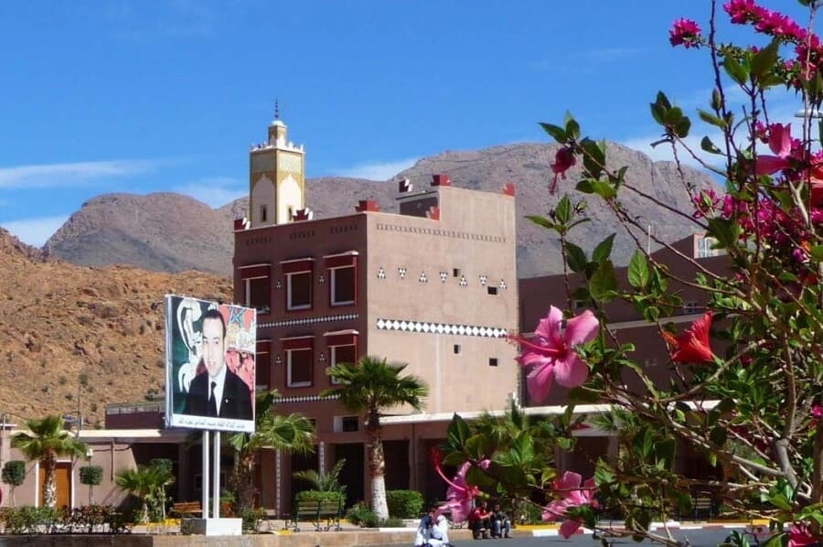 Main square in Tafraout with its minaret and the Anti-Atlas mountains
